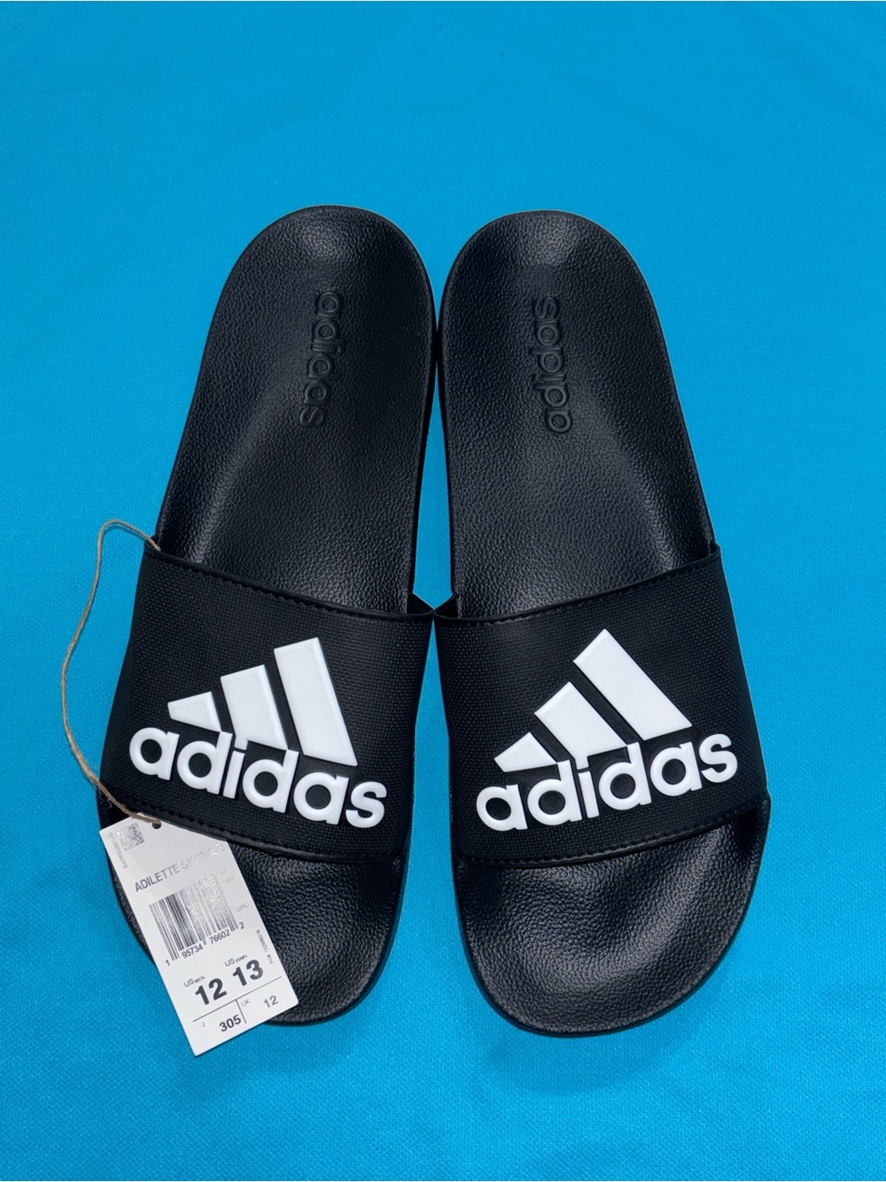adidas Black Slides with White Trefoil-Style Logo